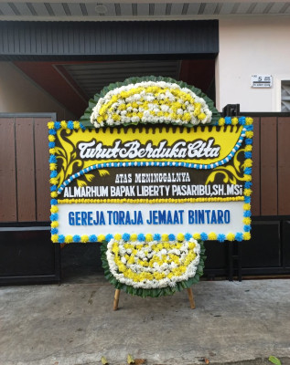 Papan Bunga Duka di Wongkaditi Barat